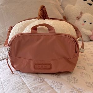 Atheta woman’s Belt Bag in the color salmon  pink